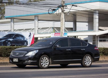 Chiangmai, Thailand - January 17 2020:  Private car, Nissan Teana. On road no.1001, North of city about 8 km from Chiangmai Center.