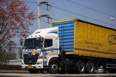 Chiangmai, Thailand - February 7 2020: Trailer Truck of PakPoom Logistic Company. On road no.1001, 8 km from Chiangmai city.