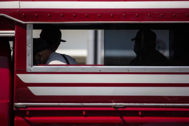 Chiangmai, Thailand - February 13 2020:  Orange mini truck taxi chiangmai, Service between city and Phrao district of Prempracha Company.