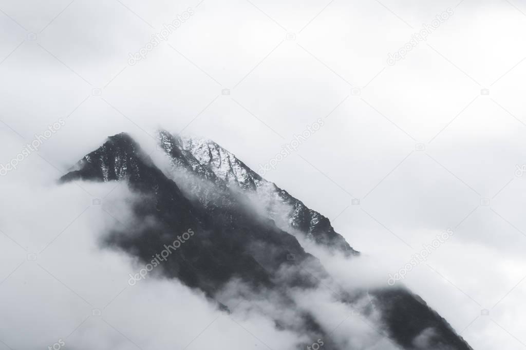 View on mountain in fog in Akkem Valley in Altai Mountains Natural Park aftern rain