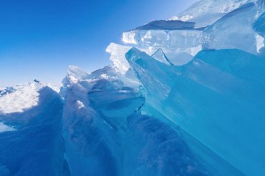 View on and through ice on frozen fields of Lake Baikal clipart