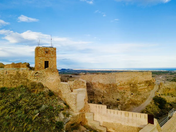 View on the castle Sagunto during sunny day and cloudy sunset — Stock Photo, Image