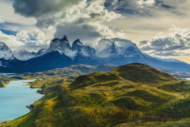 View of Torres Mountains in the Torres del Peine National Park during sunrise. Autumn in Patagonia, the Chilean side clipart