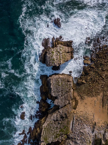 Aerial view of reefs and cliffs during sunset at Arnia Beach. Northern Spain in summer — Stockfoto