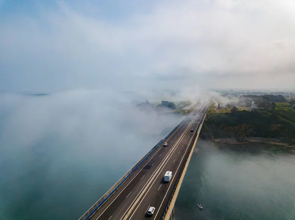 Aerial view on dos Santos bridge during fog and bay. Near Ribadeo in Northern Spain — Stockfoto