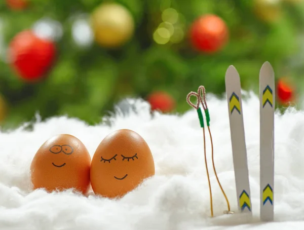 Funny lovely eggs with ski in snow