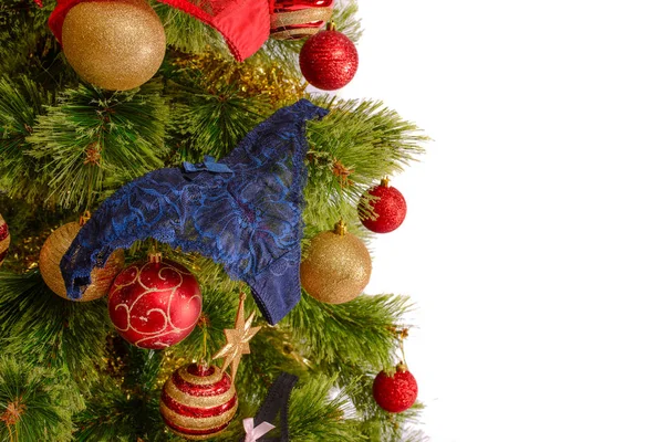 Glada studio skott av en julgran med färgglada smycken, isolerad på vit — Stockfoto
