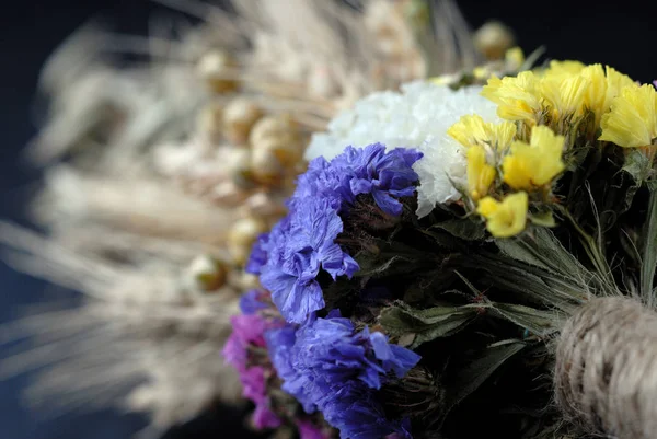 Bouquet of dried flowers and ears of wheat