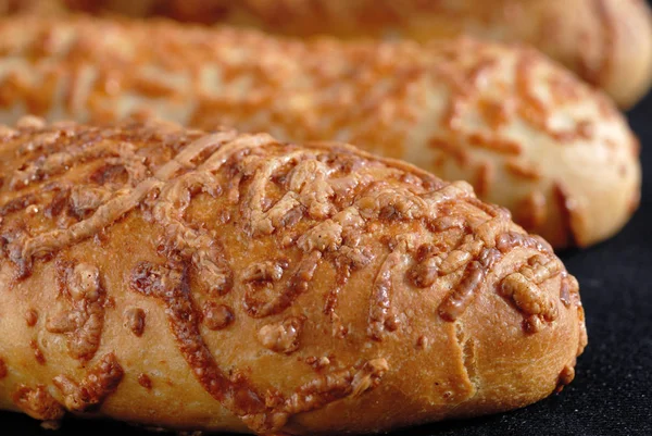 Frisch gebackene heiße, köstlich bestreute Brötchen — Stockfoto