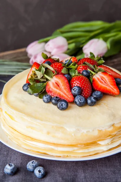 Crepes cake with cottage cheese and strawberry, selective focus