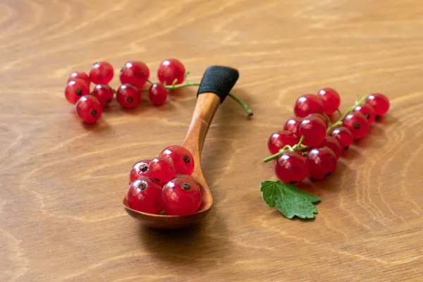 Small Wooden Spoon Full Juicy Red Current Berries Wooden Table Stock Picture