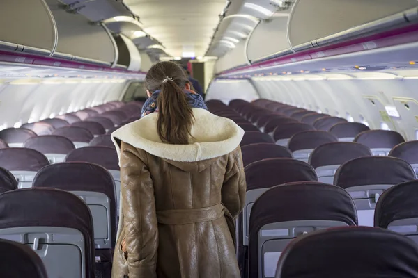 Woman in airplane — Stock Photo, Image