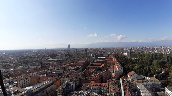 Torino, Italy - 10/24/2019: An amazing caption of Turin city in a beautifull sunny day. Detailed photography of the old buildings in the center of the city from the kingdom period in Italy.