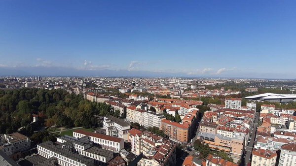 Torino, Italy - 10/24/2019: An amazing caption of Turin city in a beautifull sunny day. Detailed photography of the old buildings in the center of the city from the kingdom period in Italy.
