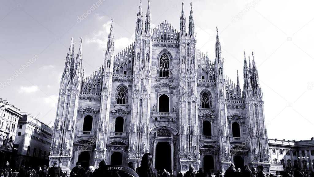 Milan, Italy - 11/08/2019: An amazing caption of Milano's old and modern architecture in black and white. Beautiful view to the details of the skylines from the street.