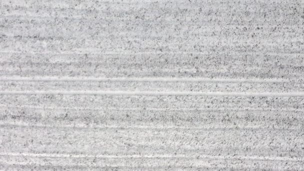 空中飘过雪地覆盖的农田 — 图库视频影像