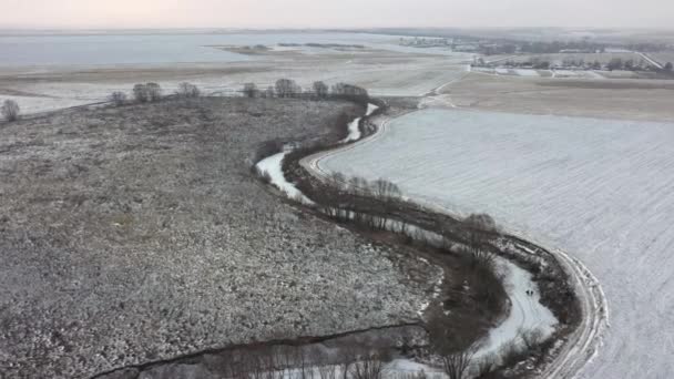 Aerial shot of the frozen river — 비디오