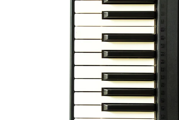 Piano keyboard på vit — Stockfoto