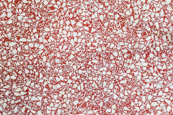 Pavimento terrazzo rosso, arancio o marmo vecchio. parete di pietra lucida — Foto Stock
