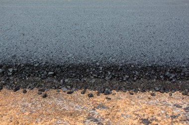 Siyah asfalt arkaplanı kapat