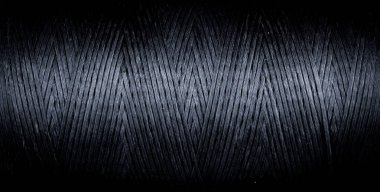 bükülmüş siyah iplik, yatay makro arka plan yakın çekim