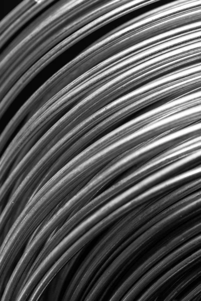 Closeup silver a coil of metal cable