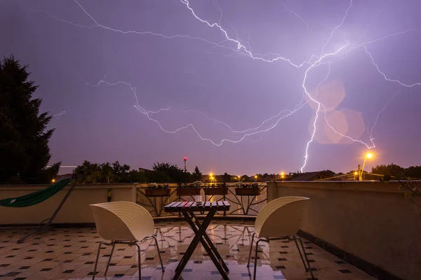 Thunder storm over a house terase in the middle of the night wit — Stock Photo, Image