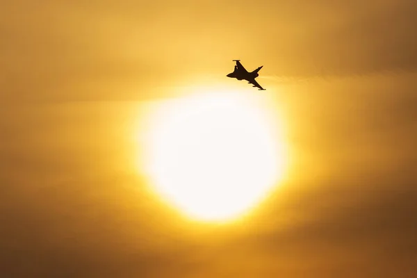 Supersonic jet fight airplane flying during sunset — Stock Photo, Image