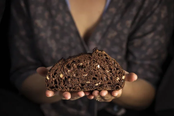 Woman Holding Her Hands Home Made Black Bread Chocolate Nuts — Stock Photo, Image