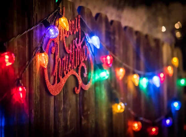 Merry Christmas sign and lights — Stock Photo, Image