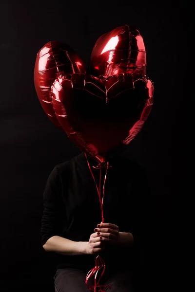 Woman Holding Bundle Heart Shaped Balloons Hands Isolated Black Valentines — Free Stock Photo