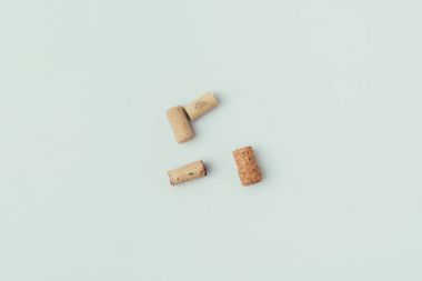 top view of arrangement of bottle corks isolated on grey clipart