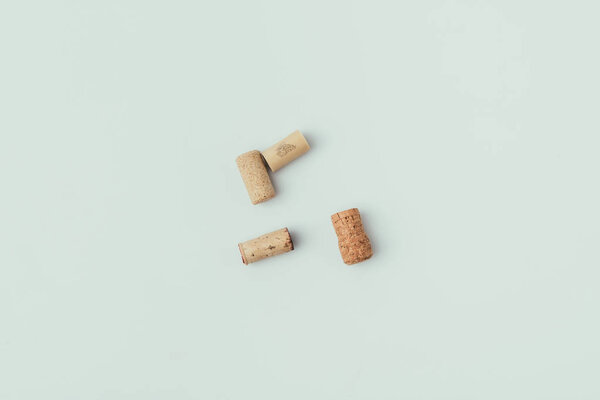 top view of arrangement of bottle corks isolated on grey