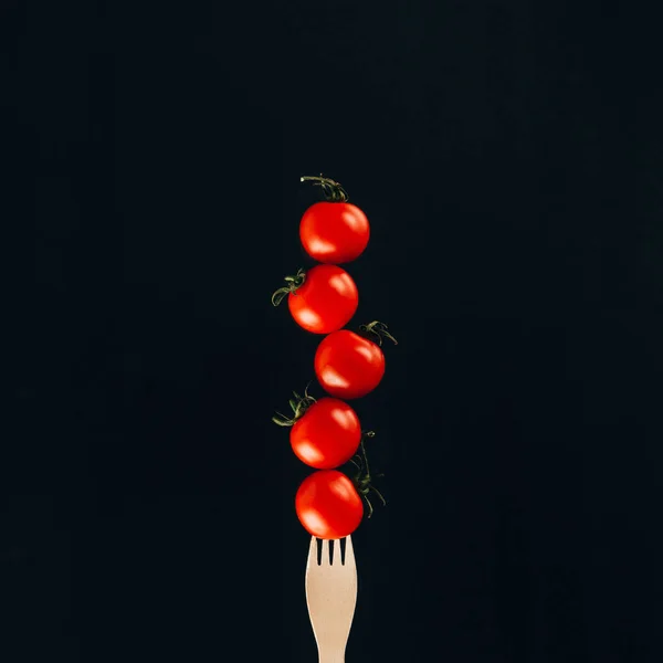 Close View Levitating Cherry Tomatoes Fork Isolated Black — Stock Photo, Image