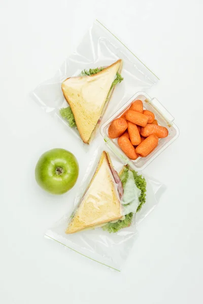 Top View Sandwiches Ziplock Bags Carrots Lunch Box Isolated White — Stock Photo, Image