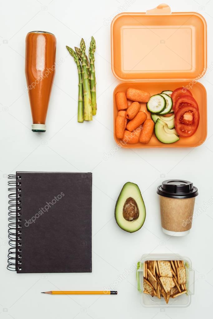 flat lay with vegetables and drinks isolated on white