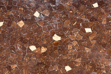 Surface of wall with brown tiles background clipart