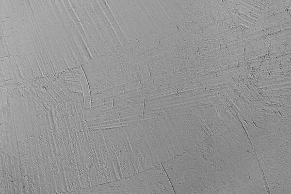 Старая серая штукатурка на стене
