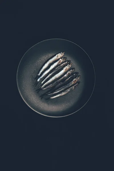 Top View Pile Fish Frying Pan Isolated Black — Free Stock Photo