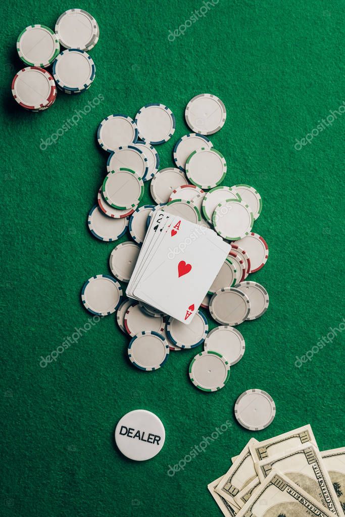 Gambling concept with cards and chips on casino table