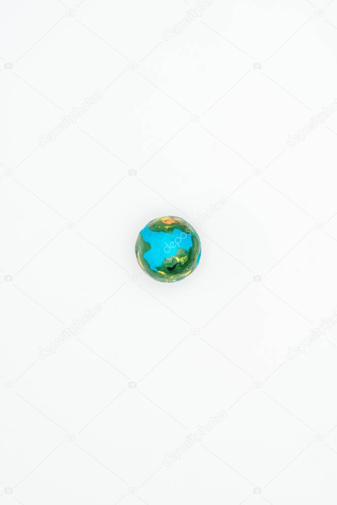 top view of earth model isolated on white, earth day concept