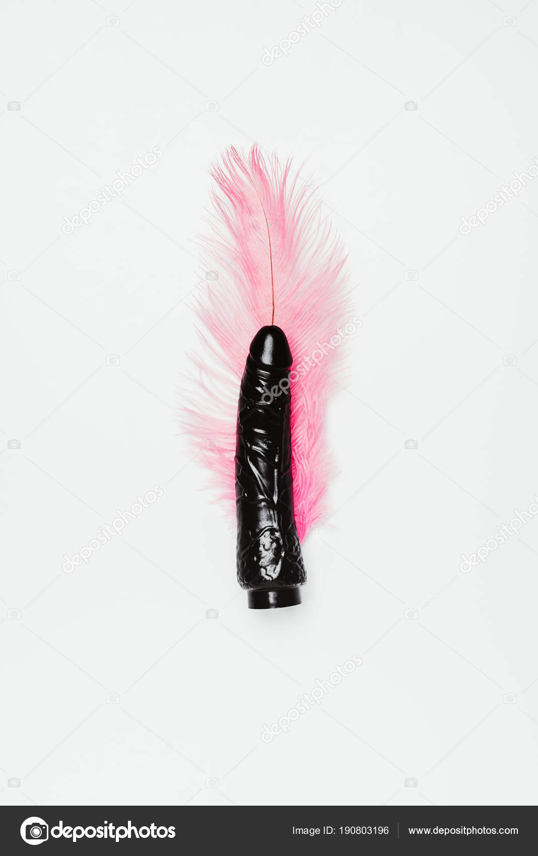 Black Dildo Toy Pink Feather Isolated White Stock Photo by ©KateNovikova 190803196