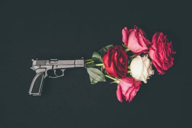 Gun shooting with bouquet of rose flowers isolated on black clipart