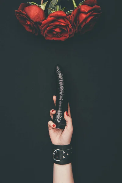 Black Dildo Female Hand Red Roses Isolated Black — Stockfoto