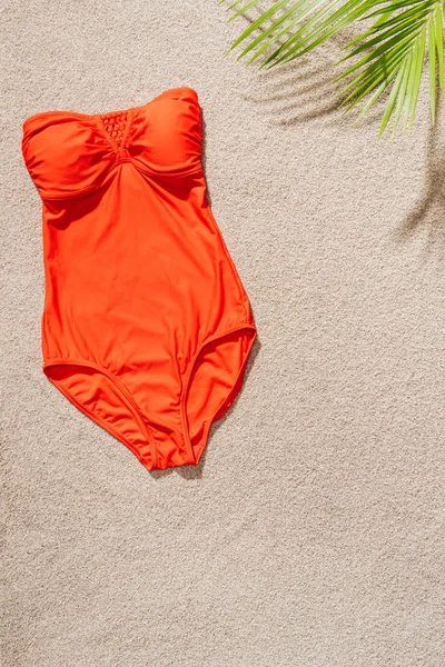 Top View Stylish Red Swimsuit Sandy Beach — Free Stock Photo
