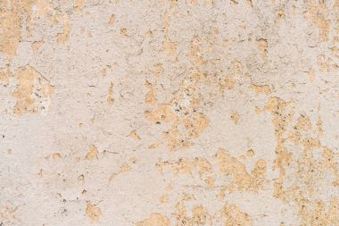 Old cracked plaster on wall background clipart