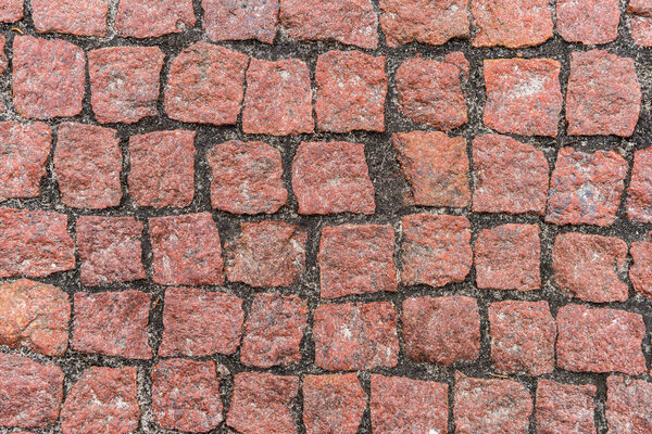 Red pebble stones road surface