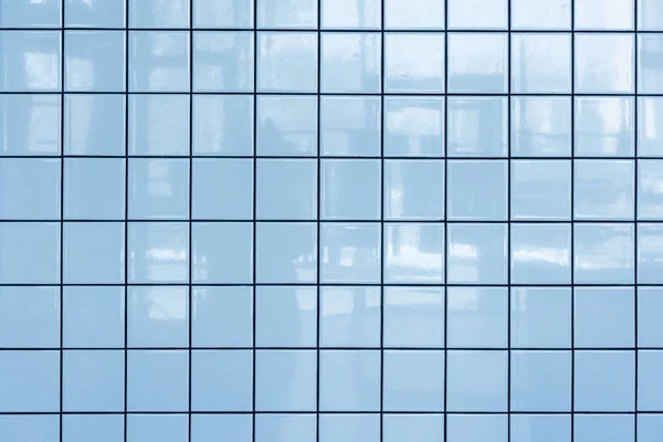 Blue glossy tiles wall pattern — Stock Photo