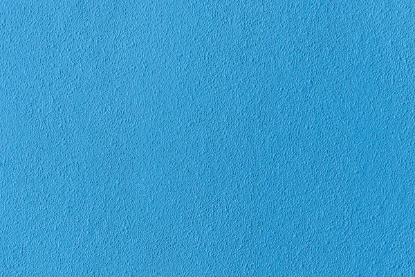 Surface of blue rough textured light wall — Stock Photo