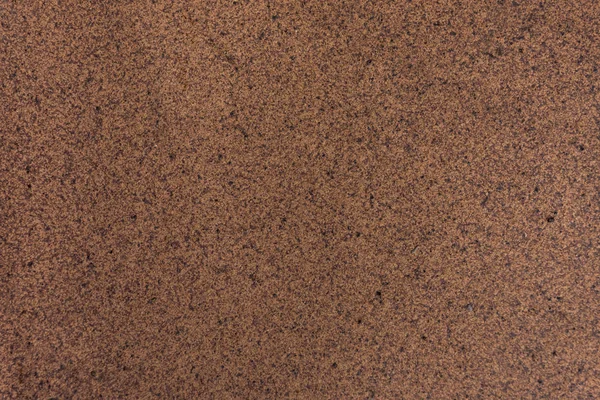 Brun surface granuleuse fond abstrait — Photo de stock